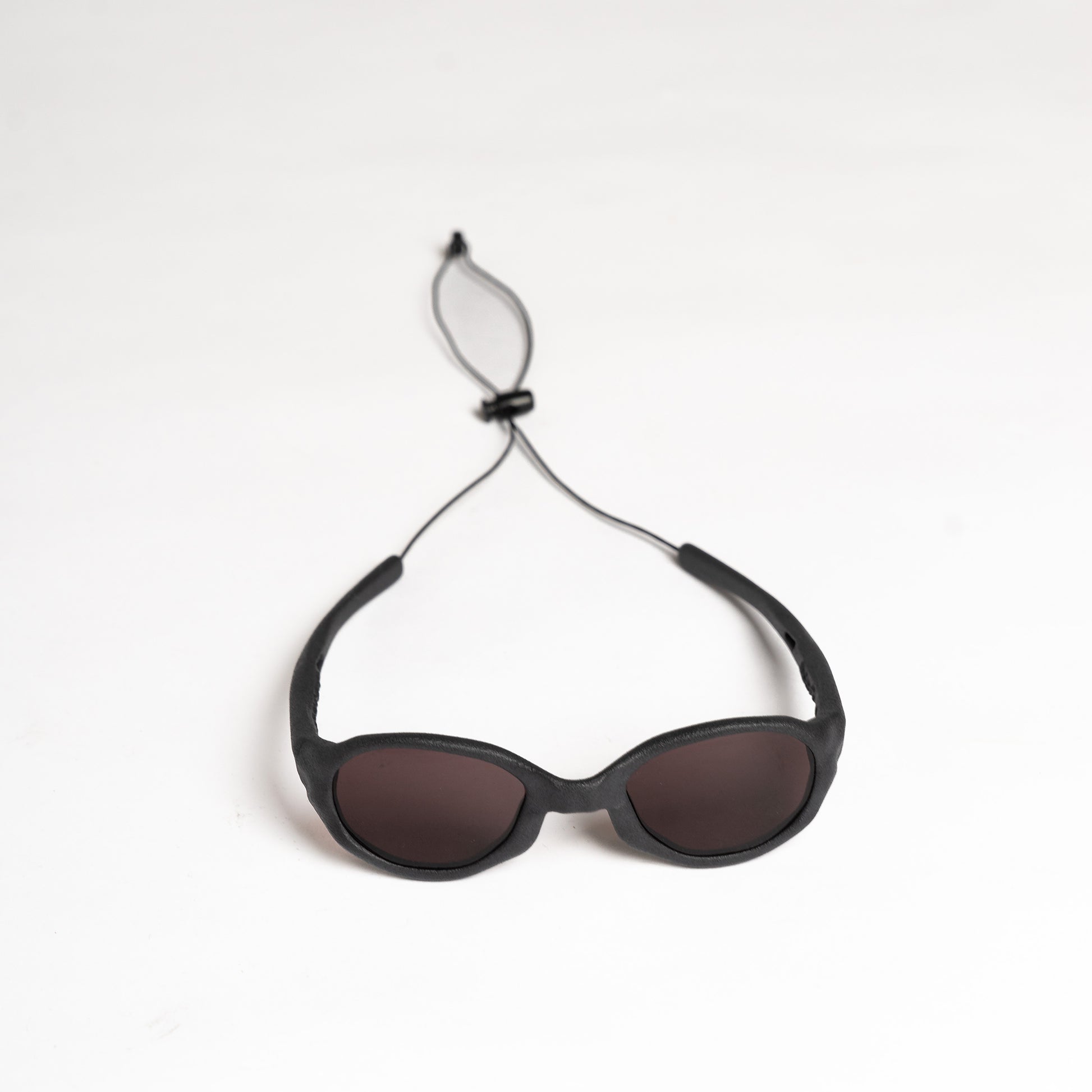 Wormholes Sunglasses – Vulcanic Black / Pyrope Red